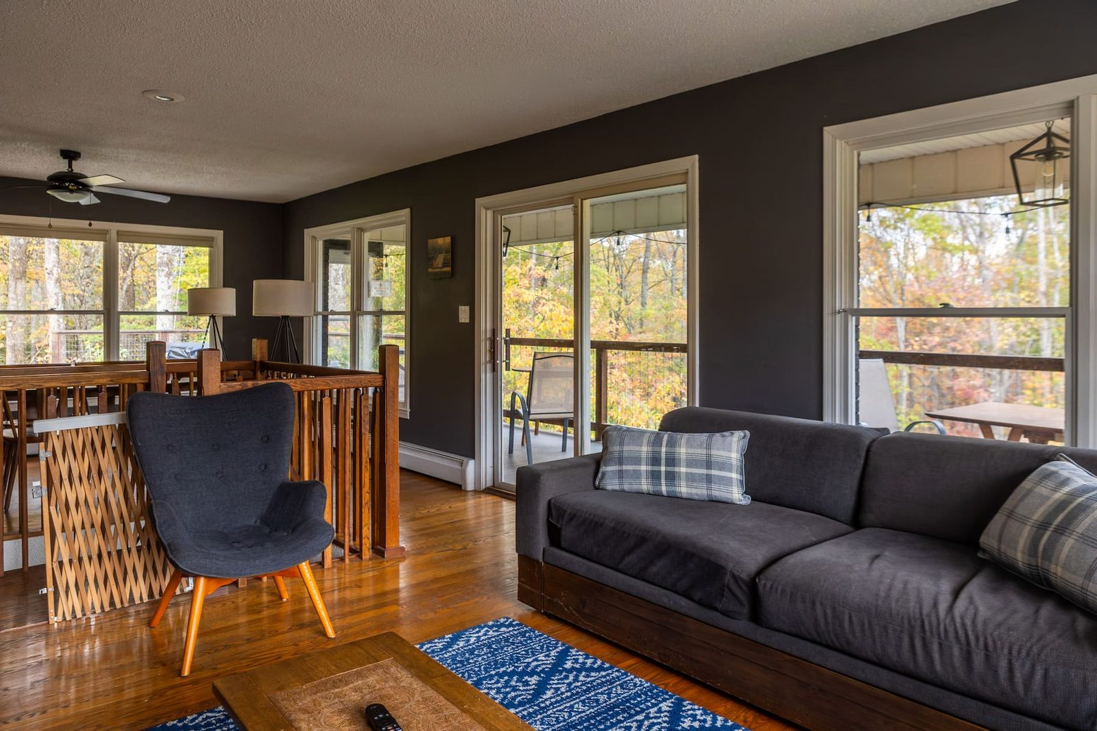 Great room with mountain-view windows at Big Rock Falls near Asheville